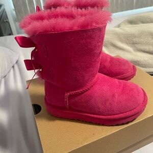 UGG Pink Boots with Plush Lining and Decorative Straps